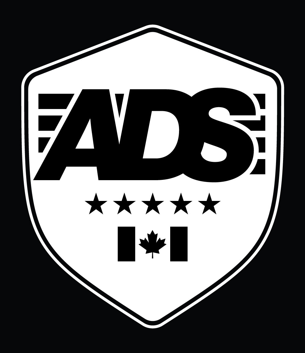 ADS shield badge in black on white, with five stars and a Canadian flag motif