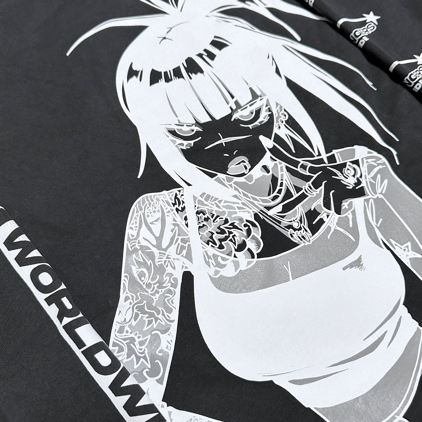 Close-up of the Revengers monochrome print showing tattoo linework detail